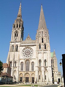 Chartres Cathedral. The Flamboyant Gothic North Tower (finished 1513) (left) and older South Tower (1144-1150) (right) 20050921CathChartresB.jpg