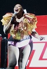 Lizzo opening for Florence and the Machine in 2018 2018 Lizzo (44617724361) (cropped).jpg