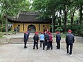 Visitors in front of the Broken Beam Hall