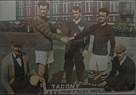 American Cup final in Philadelphia on April 19, 1913. Pictured from left to right: Linesman Addison, True Blues captain Wilson, Referee Burnside, Tacony captain Robert Morrison, and Linesman Bishop. AFAfinal1213.jpg