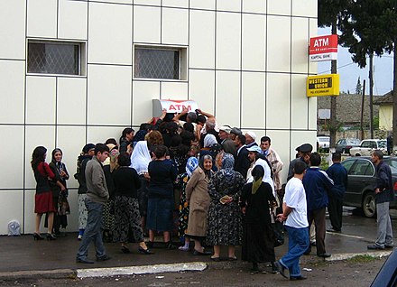 Queue to an ATM, Azerbaijan. Avoid ATMs where you have to enter the PIN with people too close.