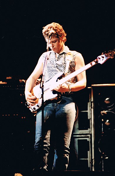 Clayton performing with U2 in September 1984
