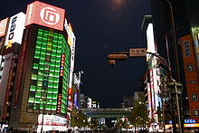 The opening to the remains of Manseibashi Subway Station is in front of the Ishimaru shopping center's Store 1 (left). The intersection is called Manseibashi, after the bridge (sign, center-right).