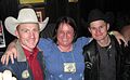 Cord (left) and Jet McCoy (right) from The Amazing Race 16, The Amazing Race 18: Unfinished Business and The Amazing Race 24: All-Stars (with fan [center])