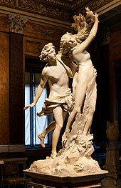 Apollo ve Daphne heykelinin bir kadın ve bir erkeği tasvir eden fotoğrafı.