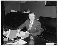 Assumes duties as Assistant Secretary of Treasury. Washington, D.C., July 1. John W. Hanes, Former New York broker and member of the S.E.C., as he assumed his duties today as the newly LCCN2016873768.jpg