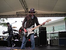 Leen performing with the Gin Blossoms in 2010.