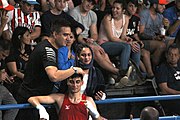 Deutsch: Boxen bei den Olympischen Jugendspielen 2018 Tag 12, 18. Oktober 2018 - Kampf um Bronze im Leichten Weltergewicht Jungen – Hassan Azim (Großbritannien, rot) schlägt Mohammed Boulaouja (Marokko, blau) RSC; Ringrichter ist Wulfren Olivares Peréz (Kolumbien). English: Boxing at the 2018 Summer Youth Olympics on 18 October 2018 – Bronze Medail Match Light Welterweight Boys - Hassan Azim (Great Britain, red) beats Mohammed Boulaouja (Morocco, blue) RSC; Referee is Wulfren Olivares Peréz (Columbia). Español: Boxeo en los Juegos Olímpicos Juveniles de Verano de 2018 en 18 de octubre de 2018 - Medalla de bronce de los hombres ligeros de peso welter: Hassan Azim (Gran Bretaña, rojo) vence a Mohammed Boulaouja (Marruecos, azul) RSC; El árbitro es Wulfren Olivares Peréz (Colombia).