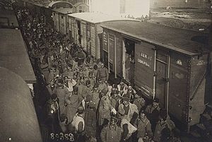 Bulgarian soldiers board at a train station in Sofia for the front. Bulgarian reservists in Sofia WW1 (15248068825).jpg