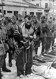 Rabbi Moshe Hagerman is attacked by German soldiers during "Bloody Monday", 31 July 1940 Bundesarchiv Bild 146-1975-073-02, Lemberg, Ordnungspolizei mit Juden.jpg