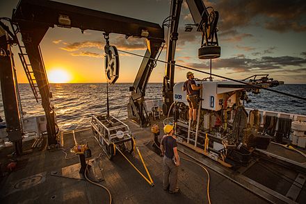 Remotely operated vehicle Deep Discoverer being prepared for deployment on the Okeanos aft deck. Image courtesy of NOAA's Office of Ocean Exploration and Research, 2016 Deepwater Exploration of the Marianas.