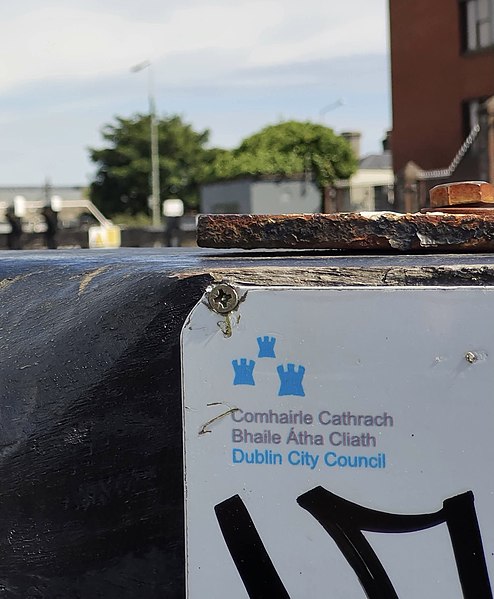 Dublin City Council's simplified "three castles" logo beside the Royal Canal in Phibsborough.