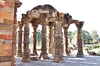 Mosque tomb over ancient temple structure in Qutb Minar complex