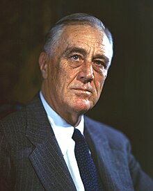 Franklin Roosevelt, 62, has graying hair and faces the camera.