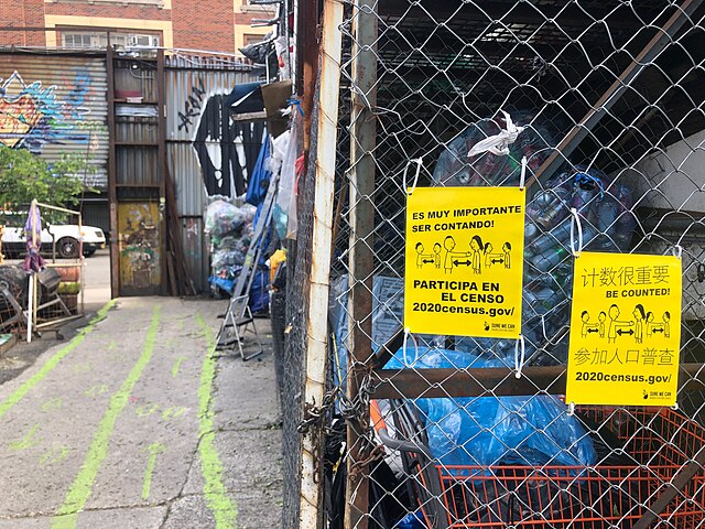 Census outreach flyers hang at Sure We Can - redemption center in Bushwick, Brooklyn - 2020