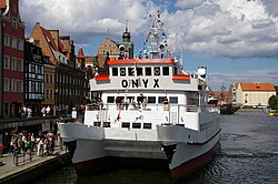 A large tourist ship "Onyx" operated by Zegluga Gdańska , one of 4 ships of this class (550 meters)