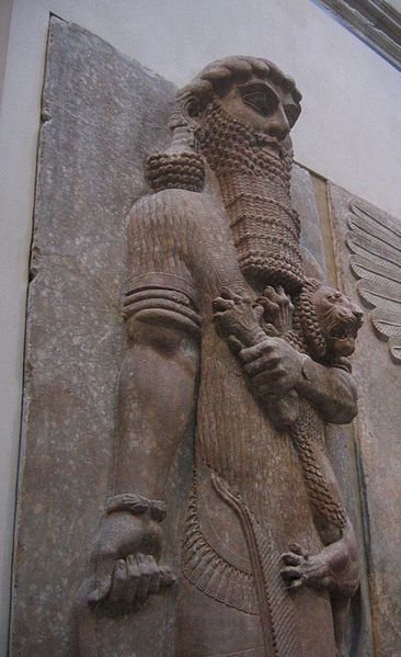 Ancient Assyrian statue currently in the Louvre, possibly representing Gilgamesh