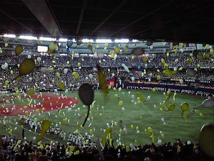 Tigers fans release balloons at the Kyocera Dome, the home stadium of the Orix Buffaloes