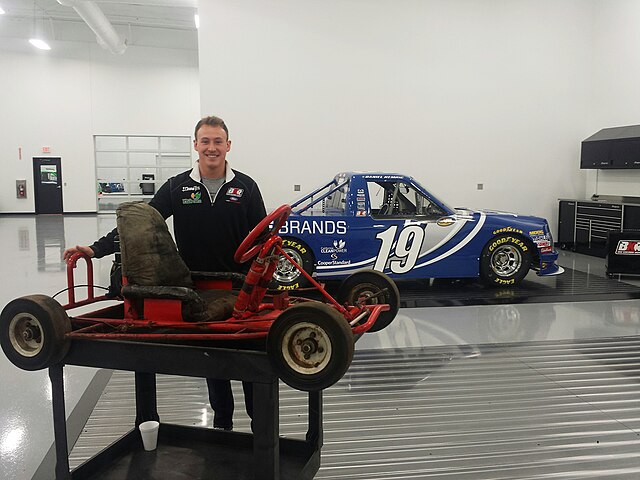 Hemric stands with his first go-kart at the Brad Keselowski Racing shop in Statesville, NC