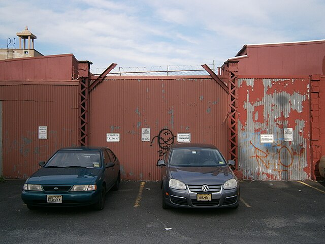Two posts of a now-demolished Hoboken Elevated trestle that carried elevated streetars over the Bergen Arches, Long Dock Tunnel, and State Highway 139