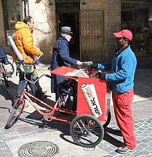 Copies of Israel Hayom being distributed in Jerusalem. Israel Hayom Jerusalem (cropped).JPG