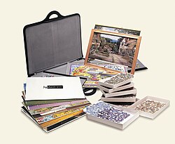 Jigsaw puzzle accessories for making, displaying and storing jigsaw puzzles. Jigsaw Puzzle Accessories Mixed.jpg