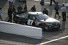 Nemechek in his No. 87 in 2013 Joe Nemechek (8722275126).jpg