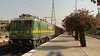 BHEL-built Kalyan WAG-9H 34004 with BCNA rake at Palej