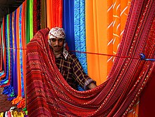 Sunday textile market on the sidewalks of Karachi, Pakistan. Karachi - Pakistan-market.jpg