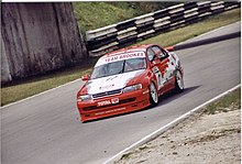 Brookes driving a Toyota Carina in the 1996 British Touring Car Championship Lee Brookes 1996 BTCC.jpg