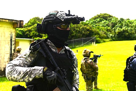 A Marine Commando during urban combat training alongside US Navy SEALs and Japanese forces at Malabar 2021.