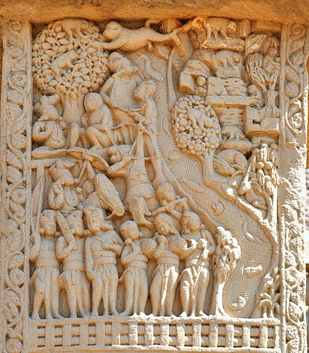 Mahakapi Jataka in Sanchi. The Buddha, in a previous life as the king of 80.000 monkeys, helps them flee and travel a stream with his own body. 1st century BCE. Mahakapi Jataka.jpg