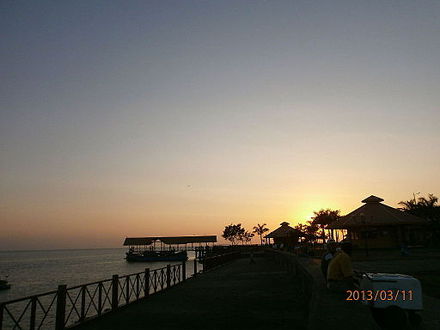 the San Carlos malecon with a view of the lake during the evening