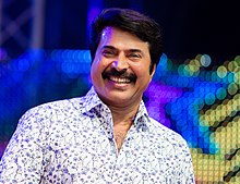Portrait photo of Mammootty, smiling during Asiavision awards
