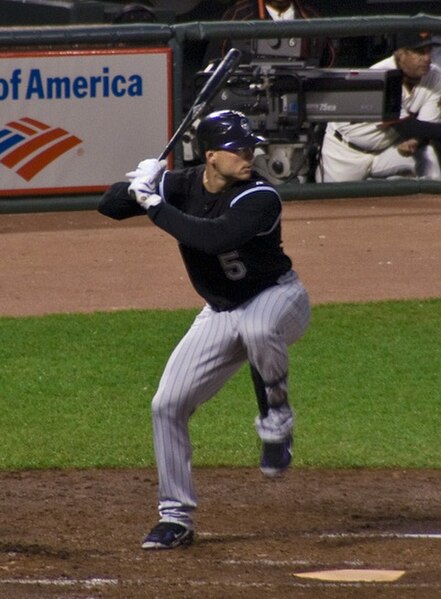 Rockies outfielder Matt Holliday, seen here during the regular season, scored the game's controversial winning run.