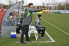 Former head coach Michael Hansen in April 2012. Sitting on the right is former assistant Claus Madsen.