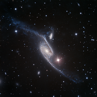 NGC 6872 Barred spiral galaxy in the constellation Pavo