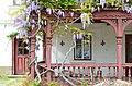 English: Veranda with wisteria on the south side Deutsch: Veranda mit Blauregen auf der Südseite