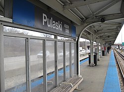 The Pulaski Blue Line station in West Garfield Park on the median of the Eisenhower Expressway. Pulaski CTA Blue Line.jpg