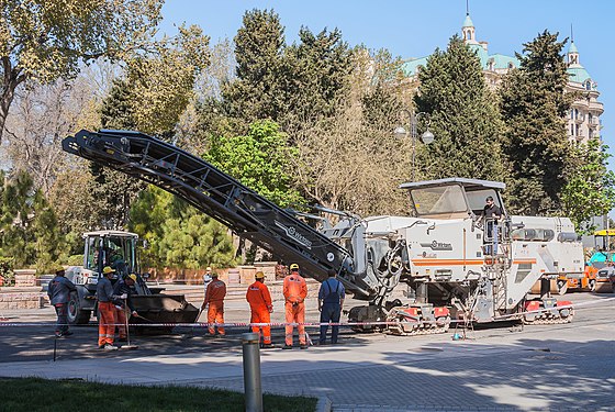 Repair of road surface by technical machines and tractors