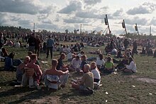 Crowds during the 1995 festival, the first year with more than 100,000 guests Roskilde Festival, 1995 (7805244248).jpg