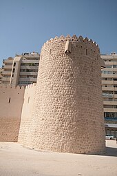 The rearward 'Al Kubs' tower was all that remained after the Fort's demolition in 1970. It has since been faithfully restored by the current Ruler of Sharjah Sharjah Fort (Al Hisn) - to the rear.JPG