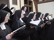 Sisters of the Daughters of Mary in traditional habit Sisters (Daughters of Mary) Roman Catholic Singing.jpg