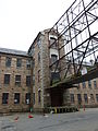 Interface of the skeleton of a raised bridge between Stone Mill and Essex Mills. Located near 15 Union Street, Lawrence, Massachusetts.