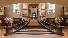 Symmetric view of the staircase at The Fullerton Hotel Singapore.jpg