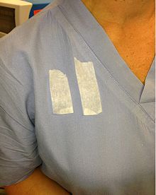 Tape awaiting placement Tape on scrubs.jpg