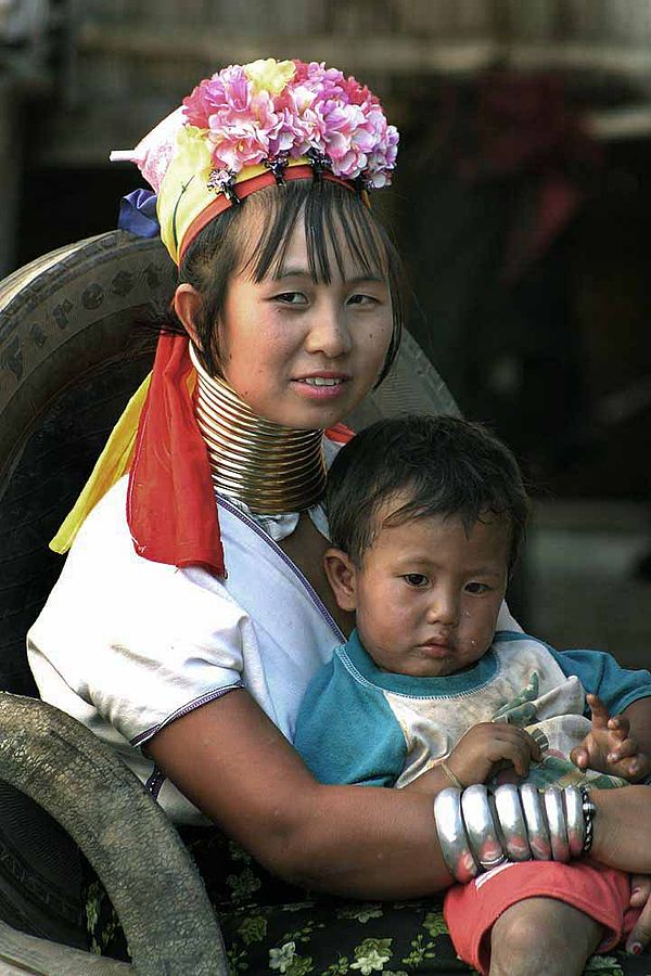 Long-necked Karen woman with child