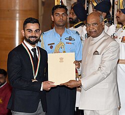 The President, Shri Ram Nath Kovind presenting the Rajiv Gandhi Khel Ratna Award, 2018 to Shri Virat Kohli for Cricket, in a glittering ceremony, at Rashtrapati Bhavan, in New Delhi on September 25, 2018.JPG