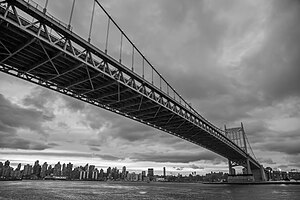 The East River suspension bridge, pictured in 2021 TriboroughBridge.jpg