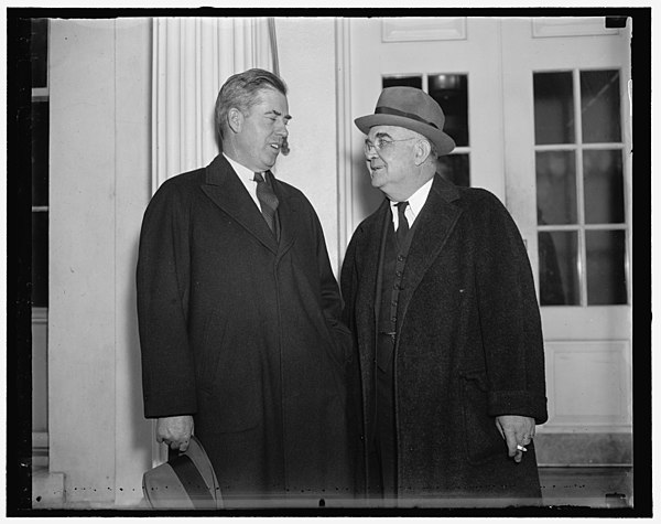 Secretary of Agriculture Henry A. Wallace (left) with Will W. Alexander, appointed to head the Resettlement Administration (December 22, 1936)